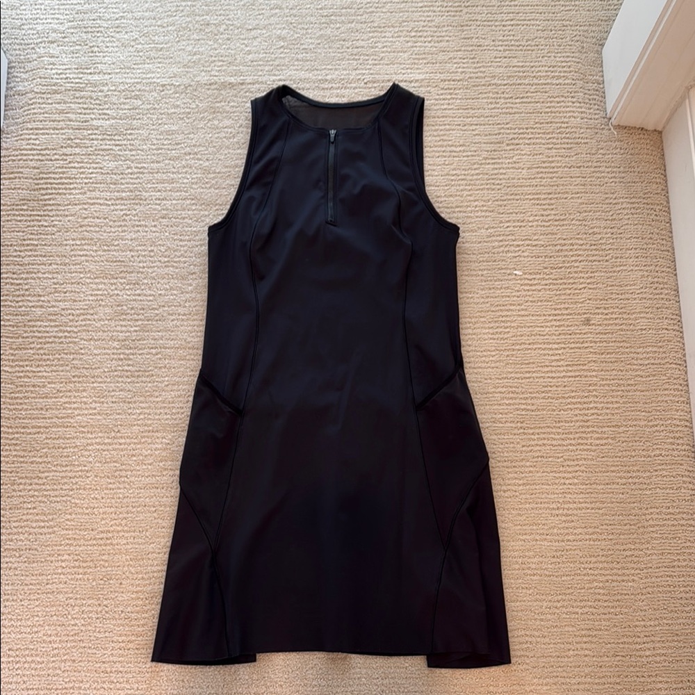 Athleta tennis dress with pockets on side- worn once for a costume  event
